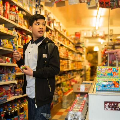 Boy in sweet shop selecting sweets